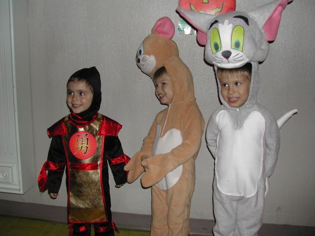 Kevin, Ryan, and Nikolas dressed up for Halloween as Tom, Jerry, and Ninja Warrior respectively