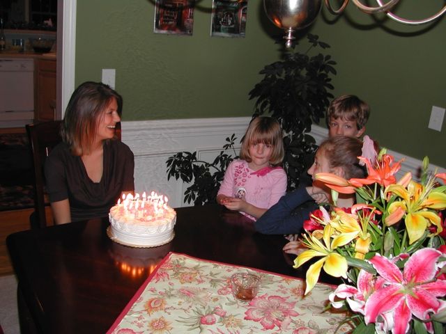Dani about to blow out the candles on her birthday cake