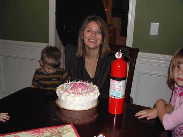 Dani after she blew out the candles on her birthday cake - fire extinguisher handy just in case