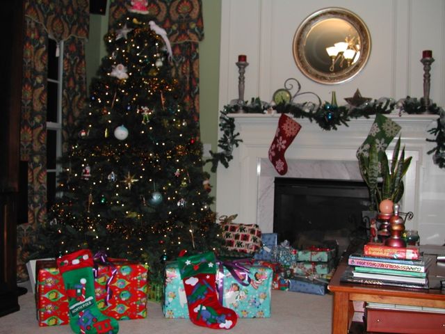 The Christmas tree with presents and stockings on Christmas eve