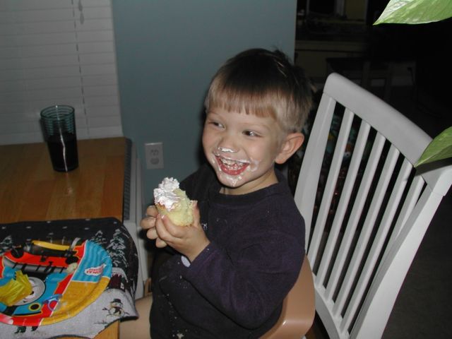 Ryan enjoying his birthday cupcake