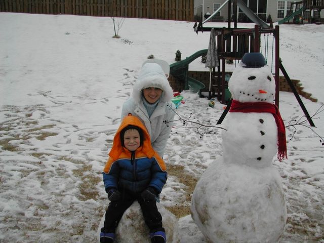 Dani and Kevin with the snowman we built in the backyard during the 2007 Greenville snow