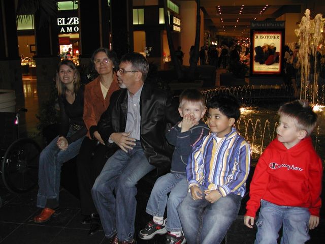 Dani, Gina, Sandu, Ryan, Davis, and Kevin by the fountain in the SouthPark mall in Charlotte, NC