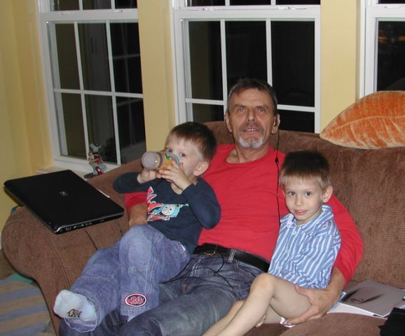 Grandpa (Sandu) with Kevin and Ryan in the sunroom