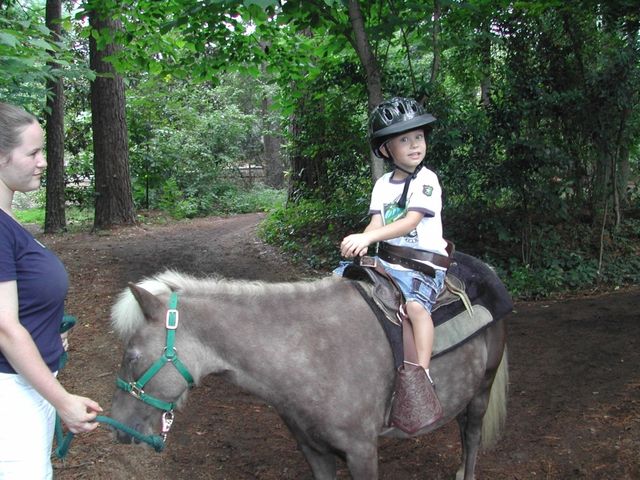 Kevin taking a pony ride at Riverbanks Zoo in Columbia, SC