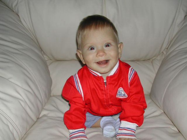 Kevin in Daddy's jacket